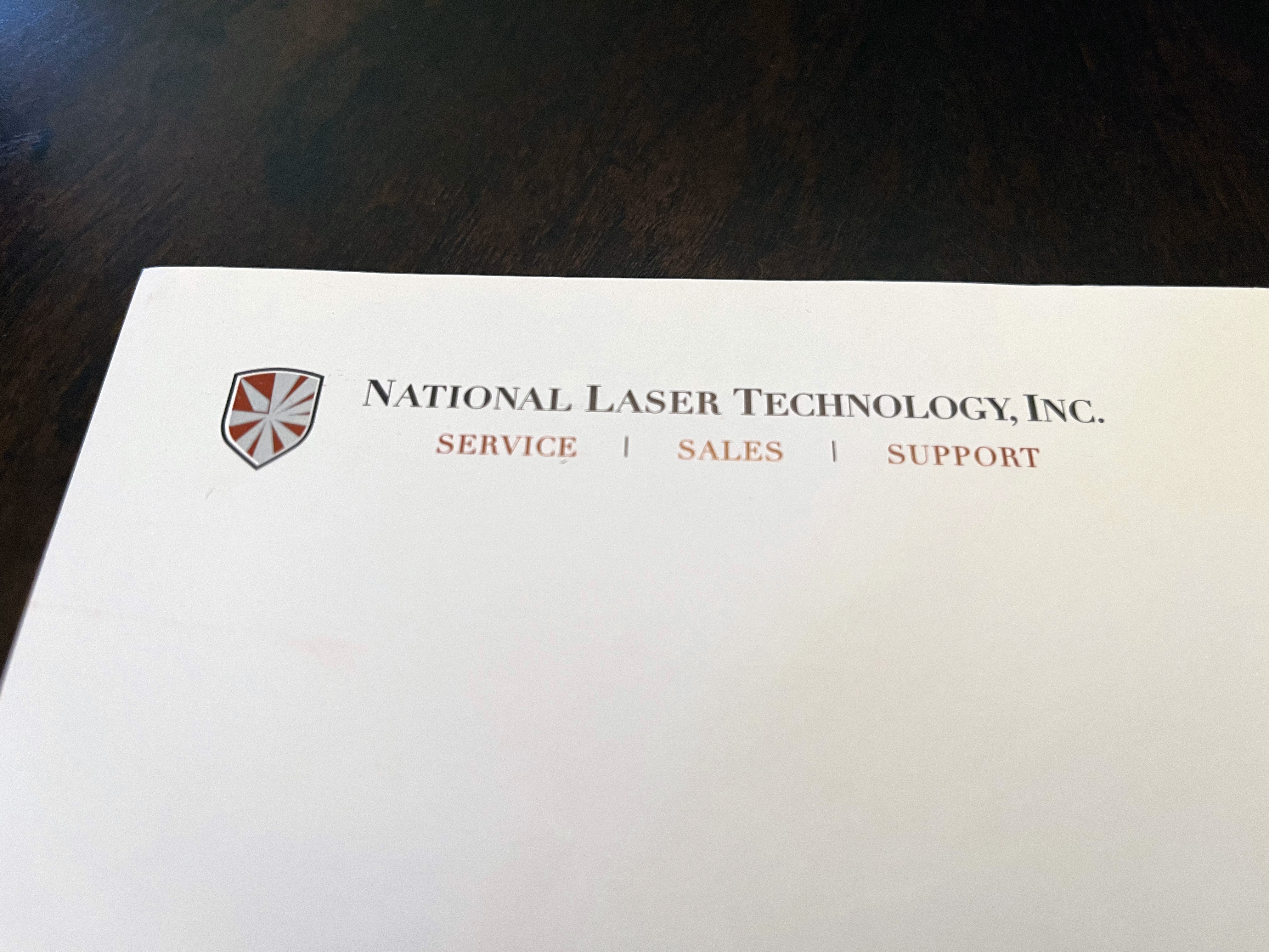 National Laser letterhead small version combination mark